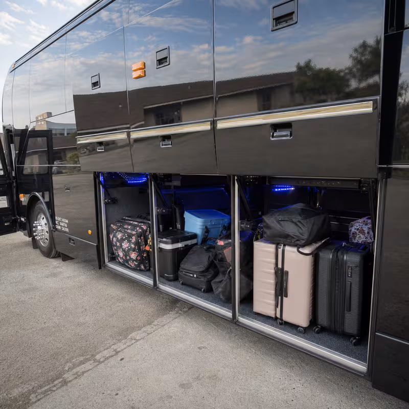 Party bus interior with wraparound leather seating and LED lighting in Lincoln